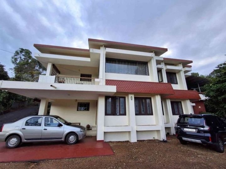 A Beautiful Kerala Home with Western Ghats Views – 67 Cents in Kanjirapally, Kottayam