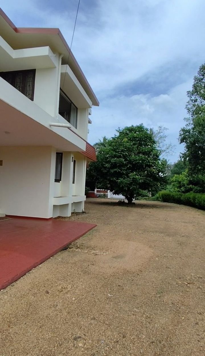 A Beautiful Kerala Home with Western Ghats Views – 67 Cents in Kanjirapally, Kottayam
