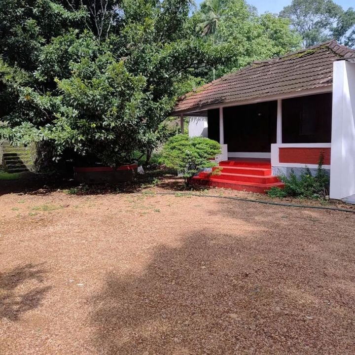 A Beautiful Kerala Home with Western Ghats Views – 67 Cents in Kanjirapally, Kottayam