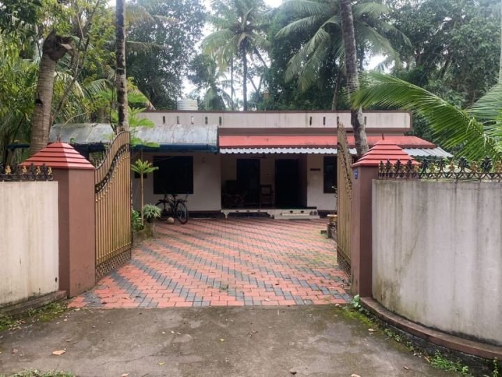 14 cent square plot and house with 4 sides compound wall..