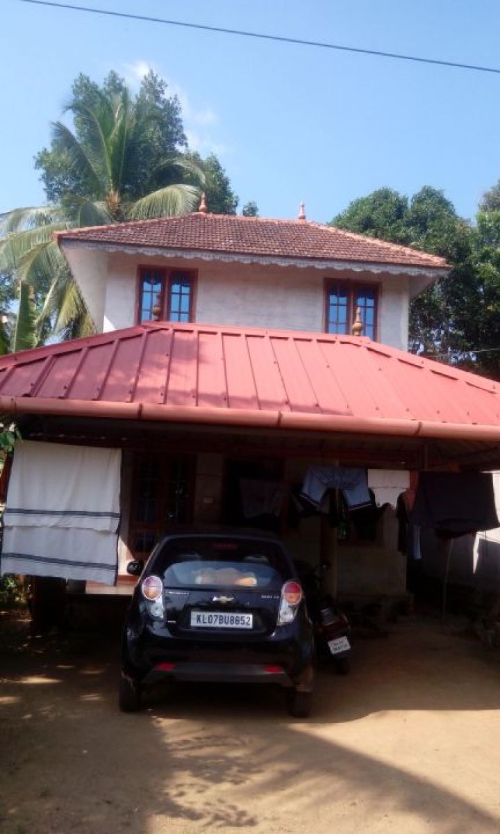 5 cent with two storied house