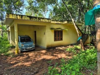 Land with a house for sale....