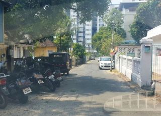 11 cents land in Thevara, 500 meters from Thavera Junction