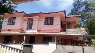 two bedroom house upstairs with attached bathroom, dining,, living, kitchen and balcony