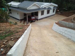 2 acres of land and 2000 square feet house at kuzhitholu, idukki